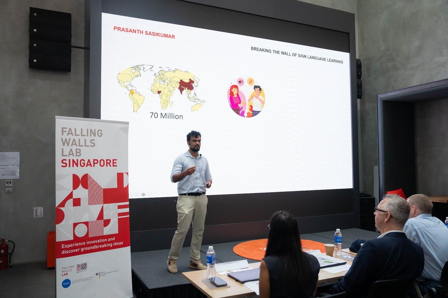 Breaking the wall of sign language learning Presenting the sign language trainer at Falling Walls Lab Singapore.