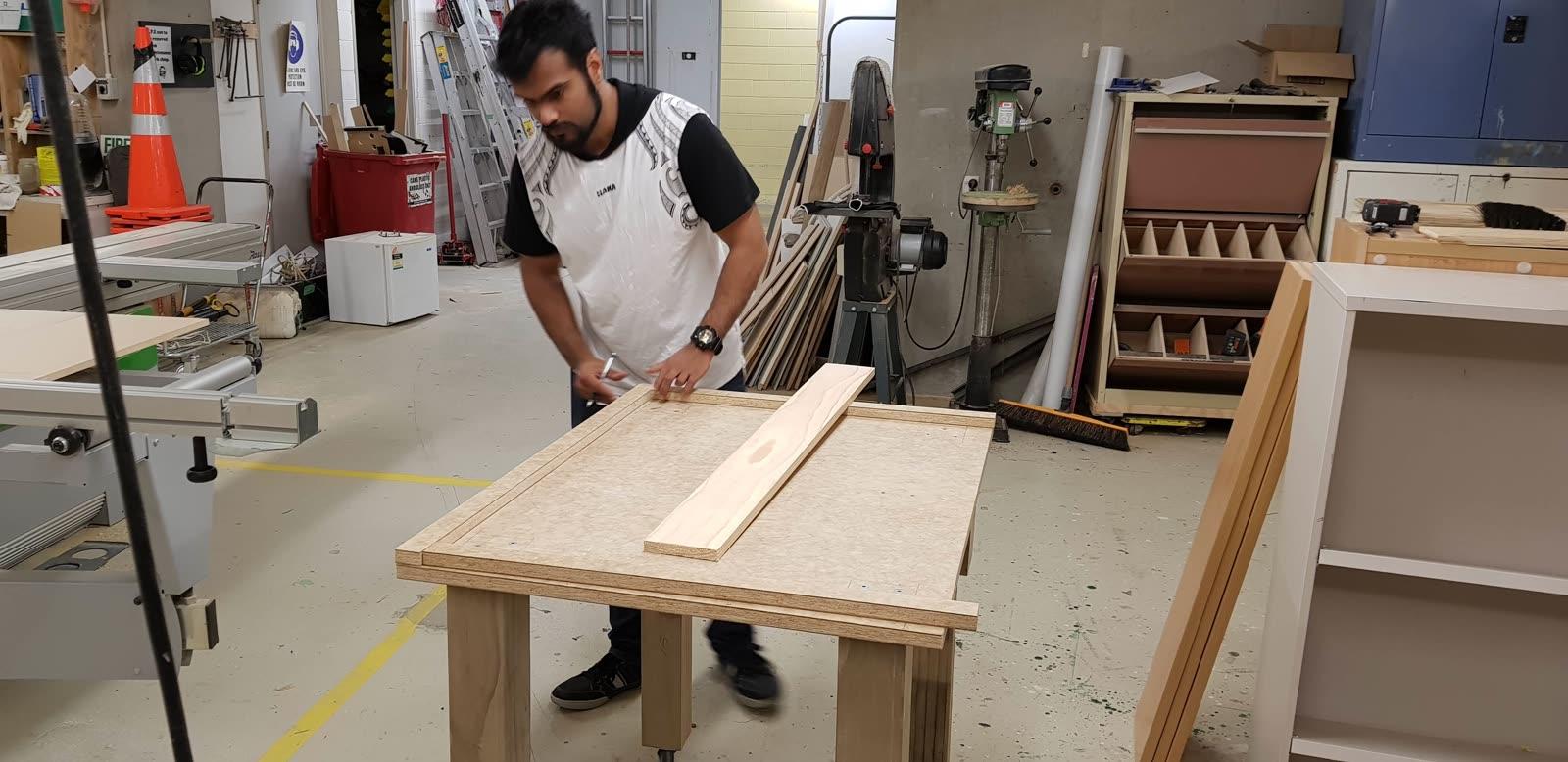 Marking out the tabletop in the Te Papa workshop