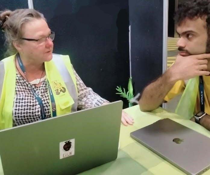 The booth doubled as a meeting room. Half the value of demoing for four days is what gets designed in the gaps between visitors Brainstorming at the booth
